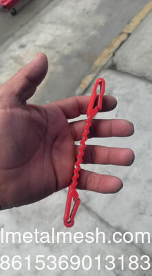Red Plastic Support Clips That Go Between The Concertina Wire And The Wire